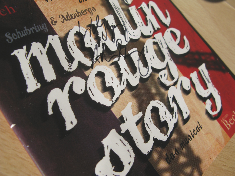 Der Gewinn: Ein von Autor Wolfgang Adenberg signiertes Exemplar der Studio-Cast-CD des Musicals "Moulin Rouge Story". moulinrougecd